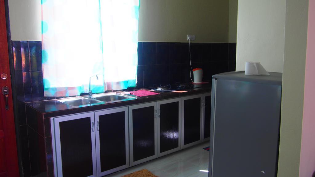 Tamteh Homestay Ayer Hitam Экстерьер фото